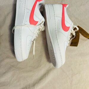 White Sneakers with Pink Swoosh